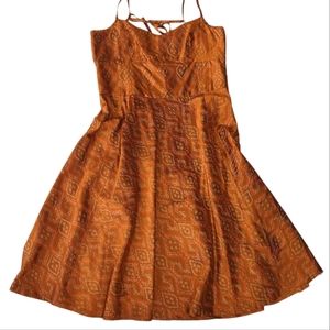 Banana Republic dress. Patterned orange silk. Fit and flare. Back tie